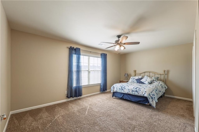 bedroom featuring visible vents, carpet, a ceiling fan, and baseboards