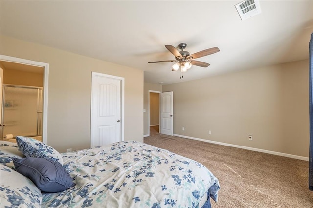 carpeted bedroom featuring a ceiling fan, visible vents, and baseboards