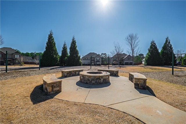 view of patio / terrace featuring an outdoor fire pit