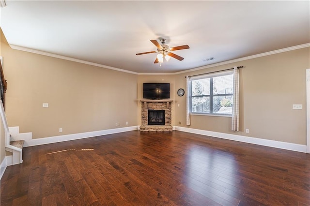 unfurnished living room featuring ceiling fan, dark wood-type flooring, a fireplace, and baseboards