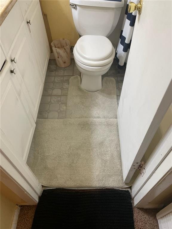 bathroom featuring toilet