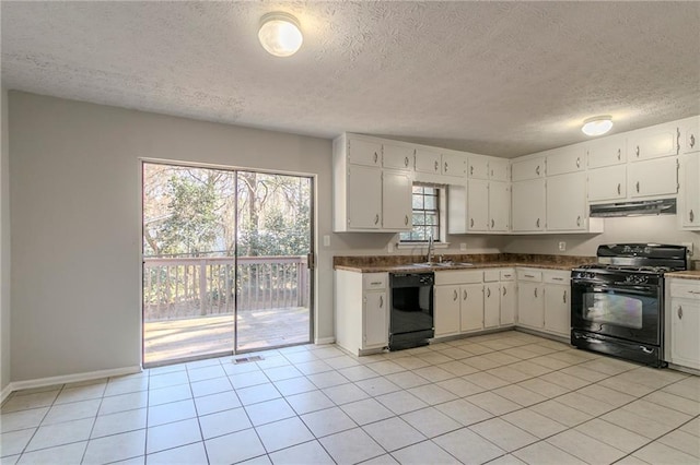 kitchen with white cabinetry, sink, light tile patterned floors, and black appliances