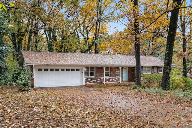 single story home with a garage