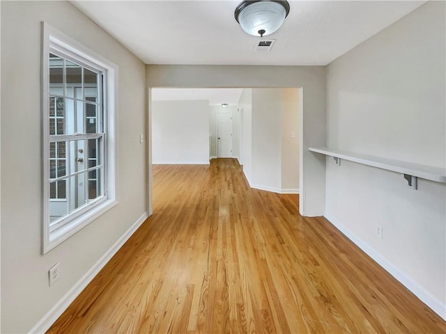 hall featuring light wood-type flooring