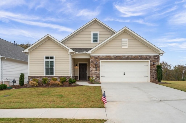 view of front facade featuring a garage, stone siding, concrete driveway, and a front yard