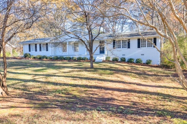 ranch-style home with a front yard