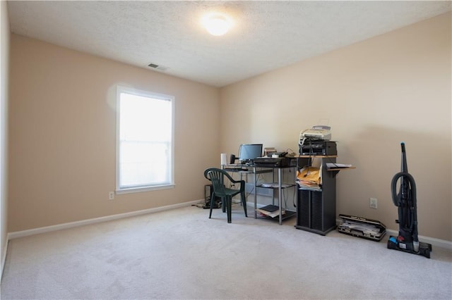 office area with carpet flooring and baseboards