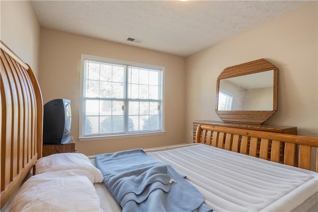 bedroom with a textured ceiling