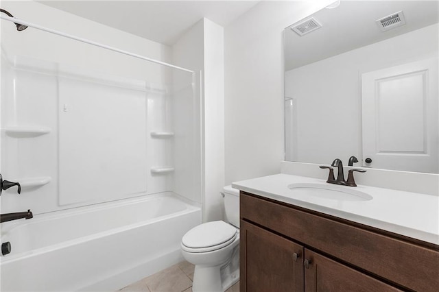 full bathroom featuring tile patterned floors, vanity, toilet, and shower / bathing tub combination