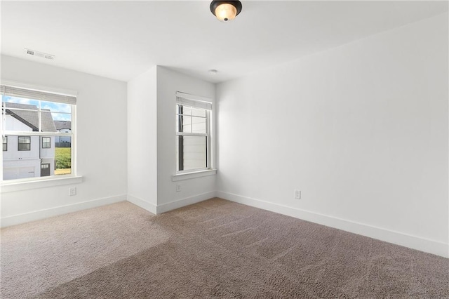 view of carpeted spare room