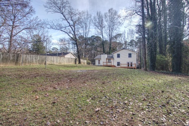 view of yard featuring a wooden deck