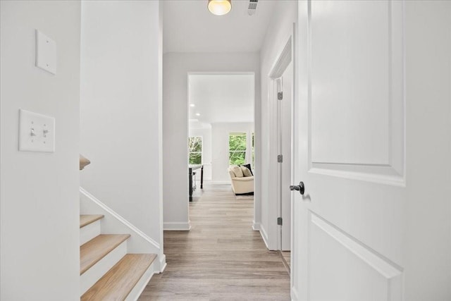 hall featuring light hardwood / wood-style flooring