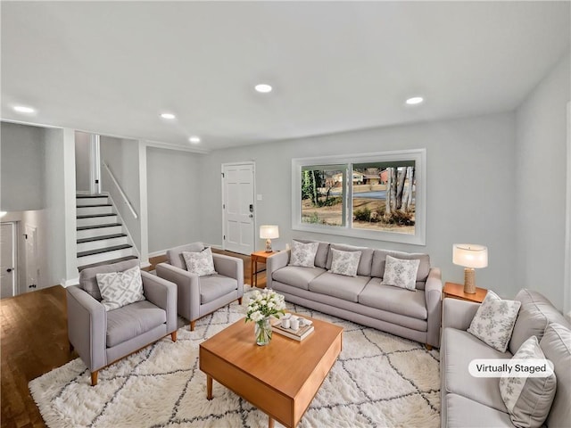 living room with light hardwood / wood-style floors