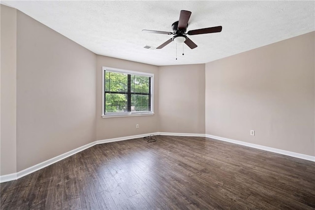 unfurnished room featuring a textured ceiling, baseboards, a ceiling fan, and wood finished floors