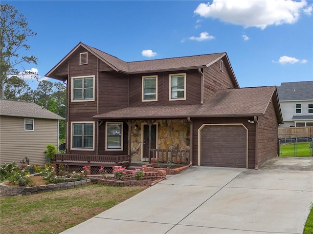 view of front of home featuring a garage, fence, roof with shingles, a porch, and driveway