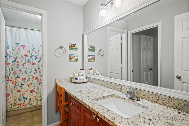 212 Brittany Ct, Duluth, GA 30096 - bathroom featuring vanity, curtained shower, and baseboards
