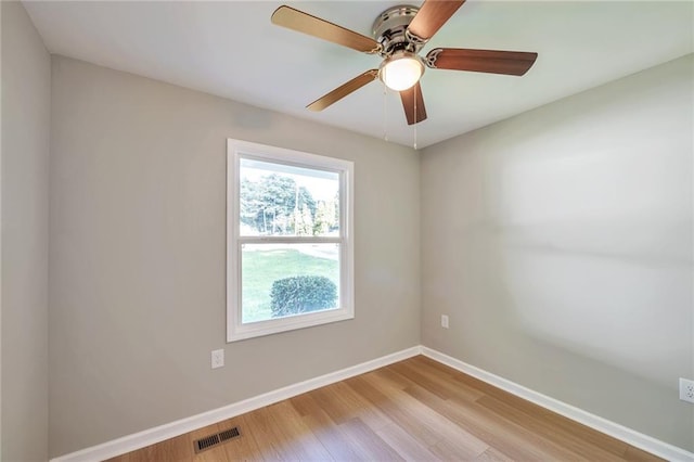 unfurnished room featuring ceiling fan and light hardwood / wood-style flooring