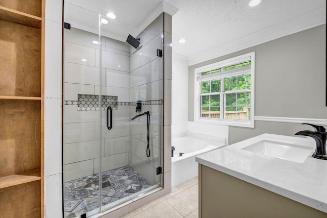 bathroom featuring a garden tub, a shower stall, tile patterned floors, ornamental molding, and recessed lighting