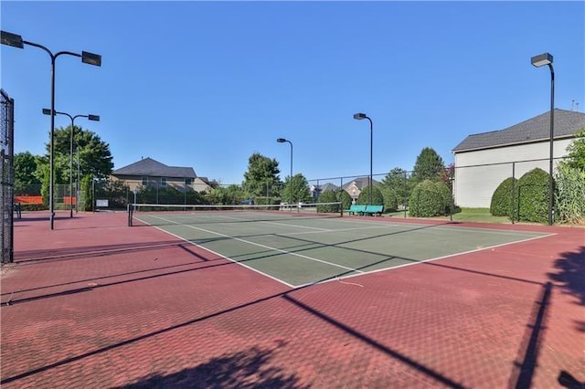 view of sport court with fence and community basketball court