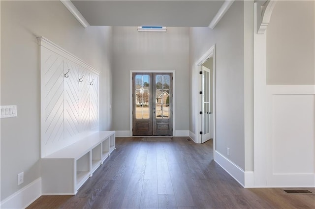 mudroom featuring ornamental molding, dark hardwood / wood-style floors, and french doors