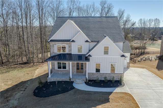 modern inspired farmhouse with covered porch