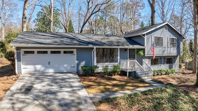 tri-level home with a garage and driveway