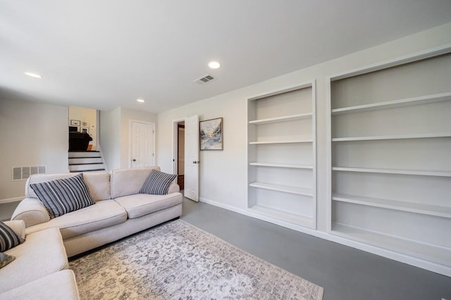 living room featuring stairs, visible vents, built in features, and recessed lighting