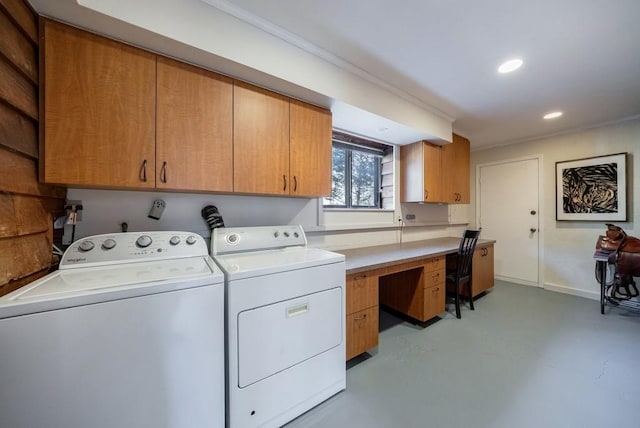 clothes washing area featuring recessed lighting, baseboards, cabinet space, and washing machine and clothes dryer