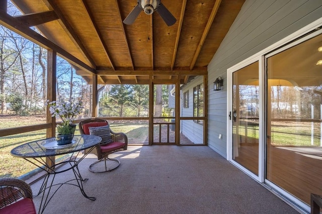 sunroom with vaulted ceiling and ceiling fan