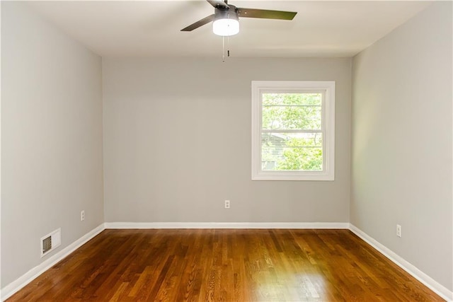 4339 Sasanqua Ct, Tucker, GA 30084 - unfurnished room featuring baseboards, wood finished floors, and a ceiling fan
