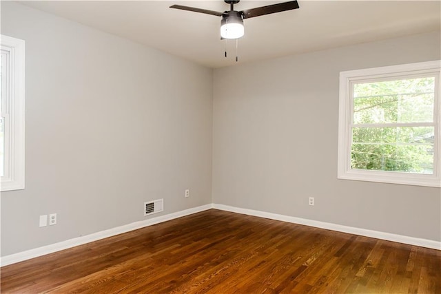 4339 Sasanqua Ct, Tucker, GA 30084 - empty room featuring baseboards, dark wood finished floors, and a ceiling fan