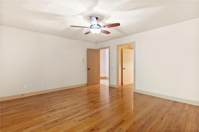8370 Royal Melbourne Way, Duluth, GA 30097 - spare room featuring ceiling fan and light wood-style flooring