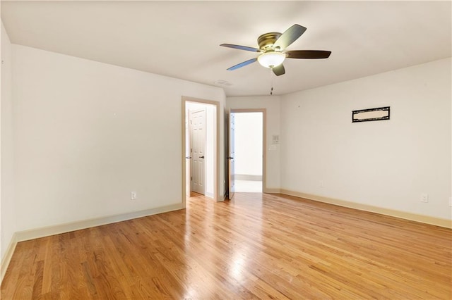 8370 Royal Melbourne Way, Duluth, GA 30097 - spare room with light wood finished floors and a ceiling fan