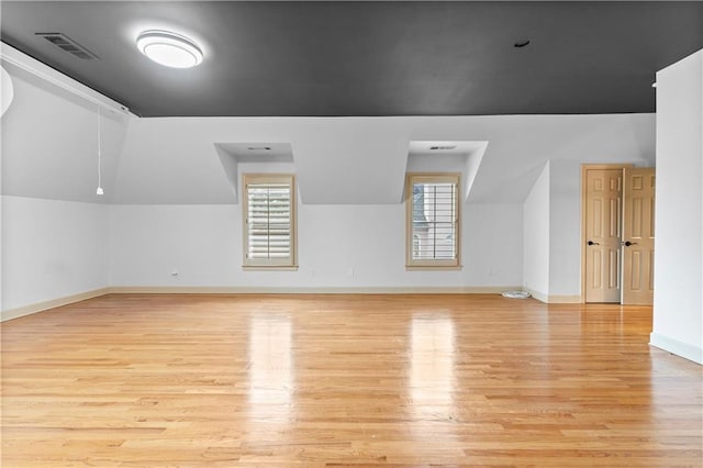 8370 Royal Melbourne Way, Duluth, GA 30097 - bonus room featuring light wood finished floors and lofted ceiling