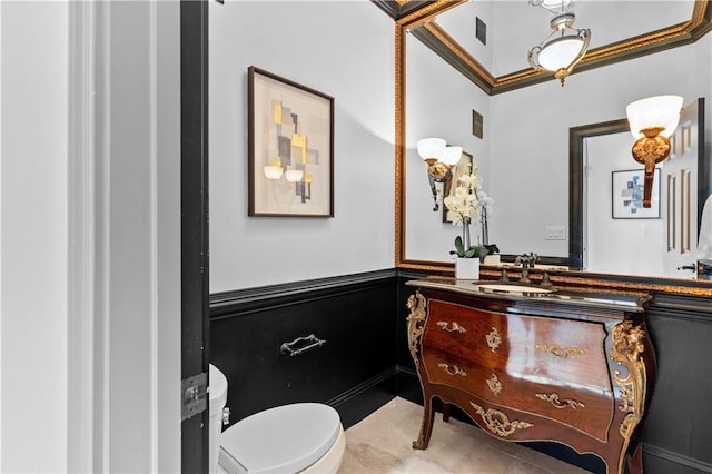 8370 Royal Melbourne Way, Duluth, GA 30097 - half bath featuring vanity and a wainscoted wall
