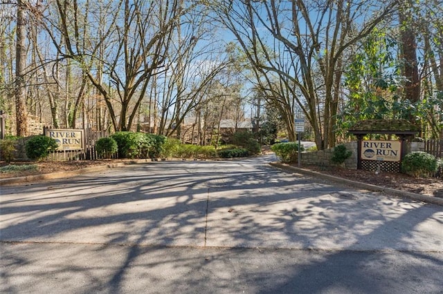 view of street featuring curbs