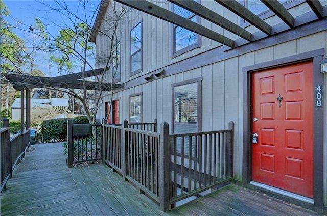 doorway to property with a wooden deck