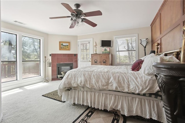 8145 Stone Hill Rd, Cumming, GA 30028 - carpeted bedroom with access to outside, a fireplace, and ceiling fan