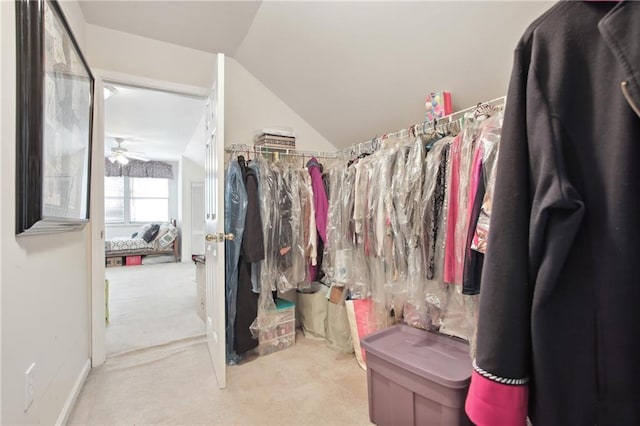 8145 Stone Hill Rd, Cumming, GA 30028 - spacious closet featuring carpet floors, lofted ceiling, and ceiling fan