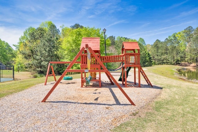 view of playground with a lawn