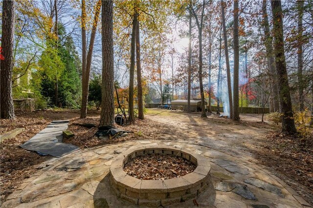 view of patio / terrace with an outdoor fire pit