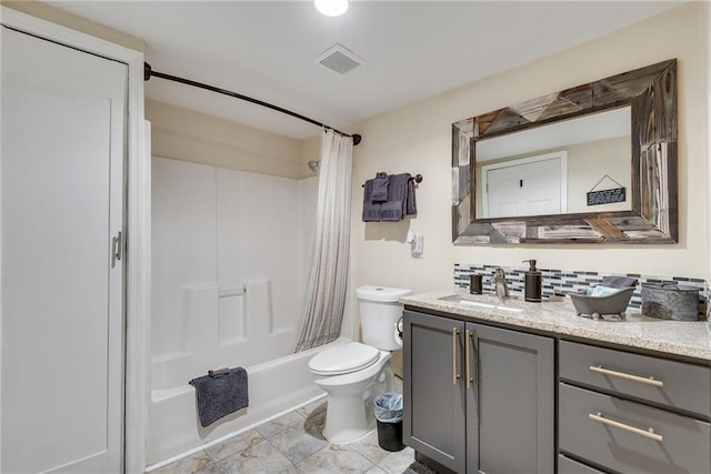 full bathroom featuring vanity, toilet, shower / bathtub combination with curtain, and visible vents