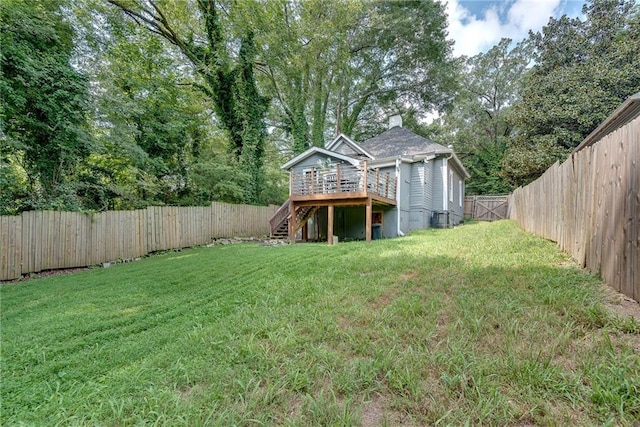 view of yard with stairs, a deck, cooling unit, and a fenced backyard