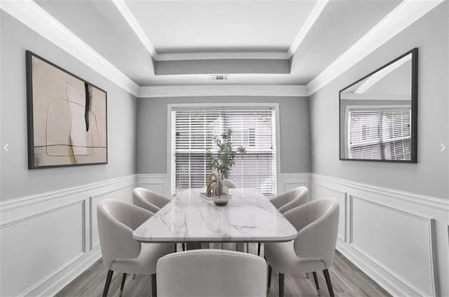 dining room with wood-type flooring