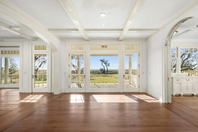 entryway featuring beamed ceiling, french doors, dark hardwood / wood-style floors, and coffered ceiling