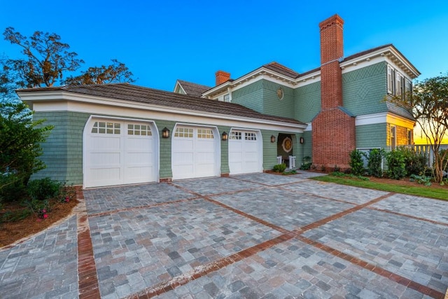 view of front of property featuring a garage