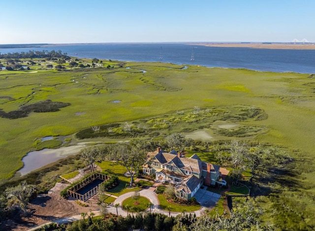 bird's eye view with a water view and a rural view