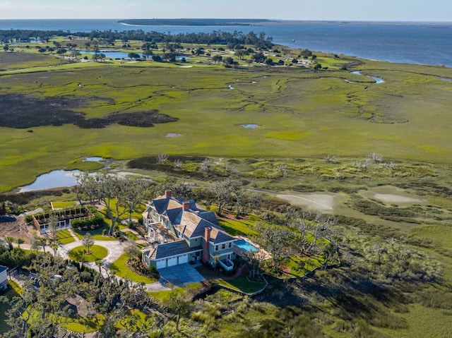 birds eye view of property featuring a rural view and a water view