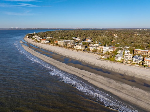 aerial view featuring a view of the beach and a water view