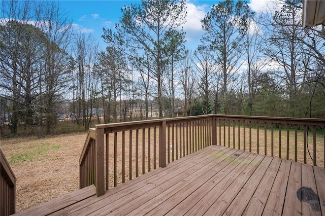 wooden deck with a yard